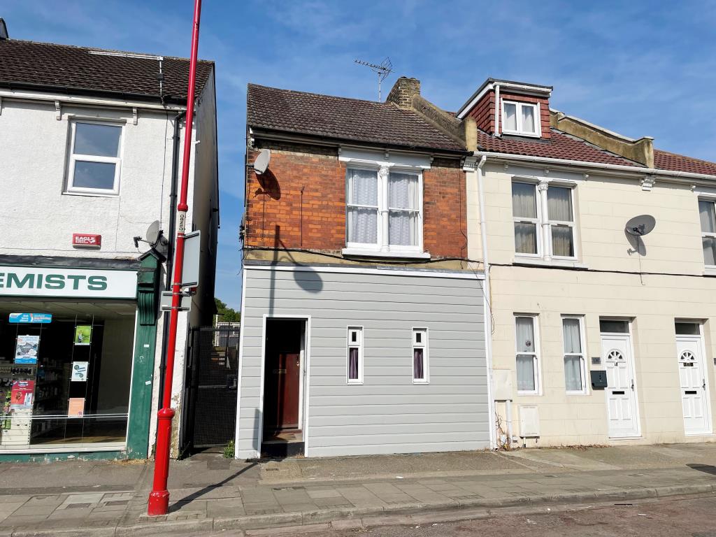Lot: 13 - HOUSE IN NEED OF REFURBISHMENT - view of the front of 132 Delce Road